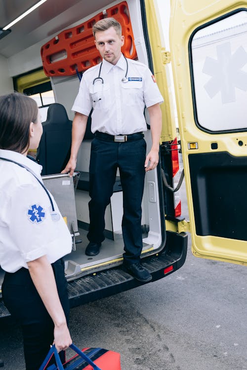 Free Paramedics Working as Ambulance Medical Personnel Stock Photo