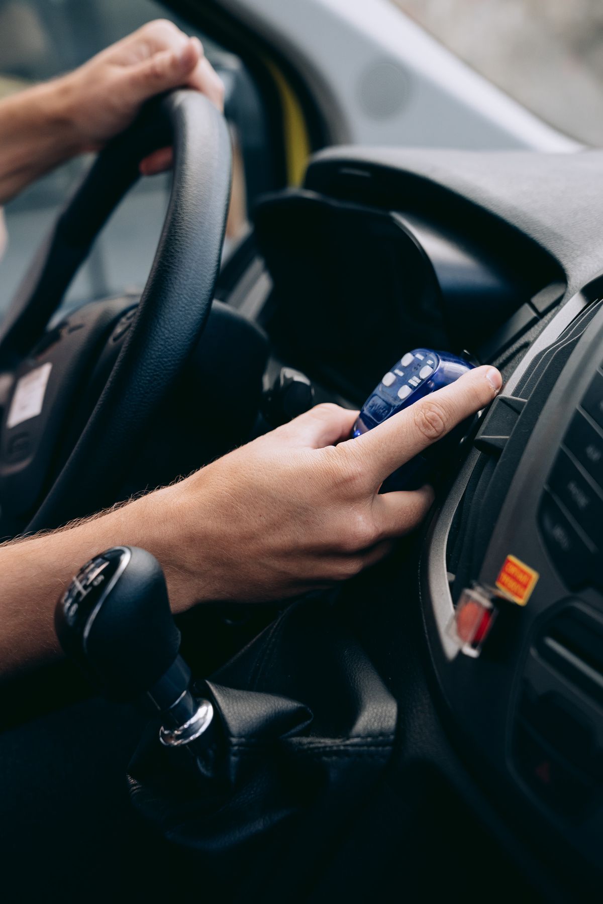 Close-up of car ignition and dashboard equipment