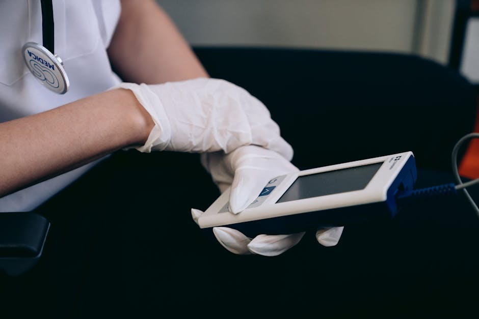 a healthcare professional using a diagnostic device - medical supplies supplier a healthcare professional using a diagnostic device - medical supplies supplier