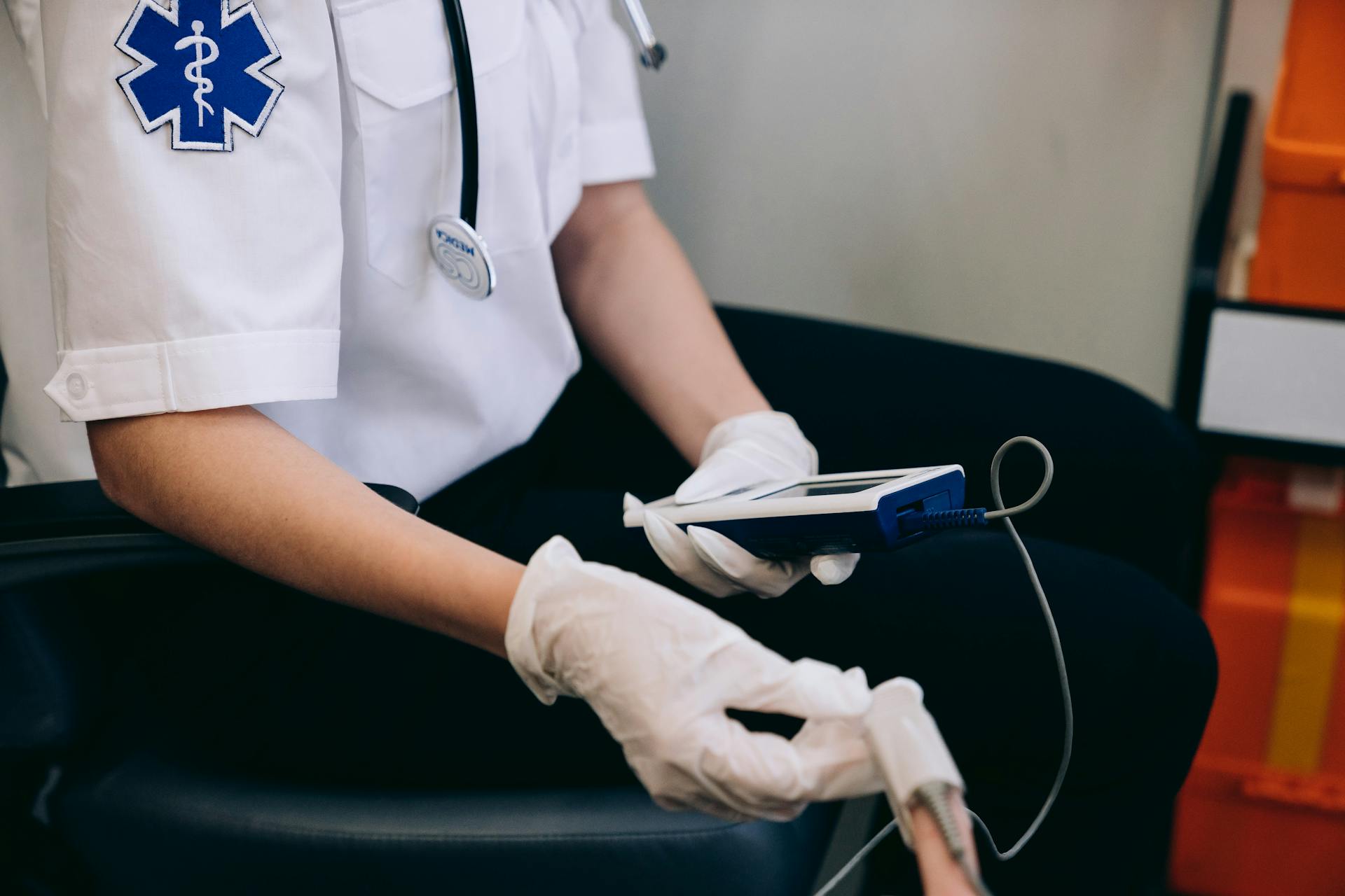 Lifeguard Holding a Medical Equipment