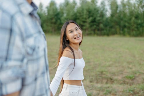 Woman in White Crop Top