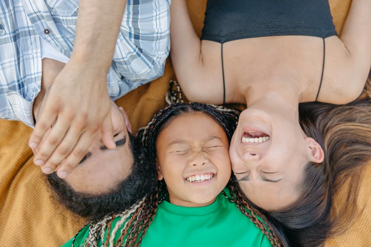 Overhead Shot Of A Family Laughing