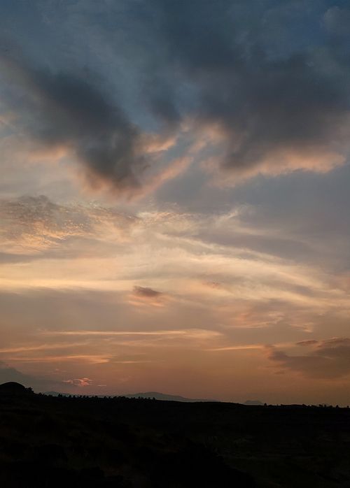 Free Beautiful sunset with dramatic clouds over Satara hills in India. Stock Photo