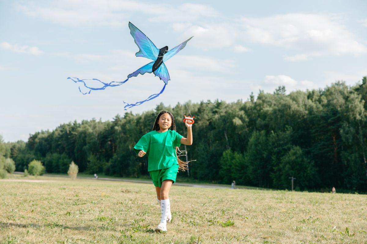 Girl flying a kite