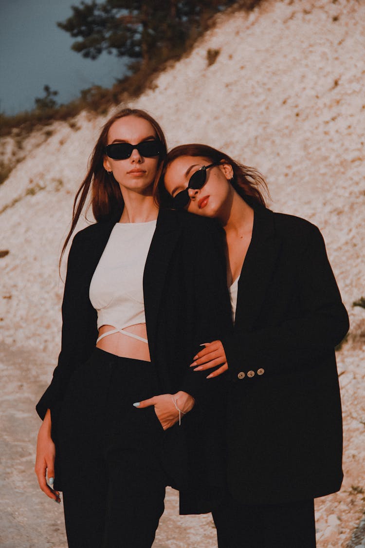 Photograph Of Women Wearing Black Sunglasses