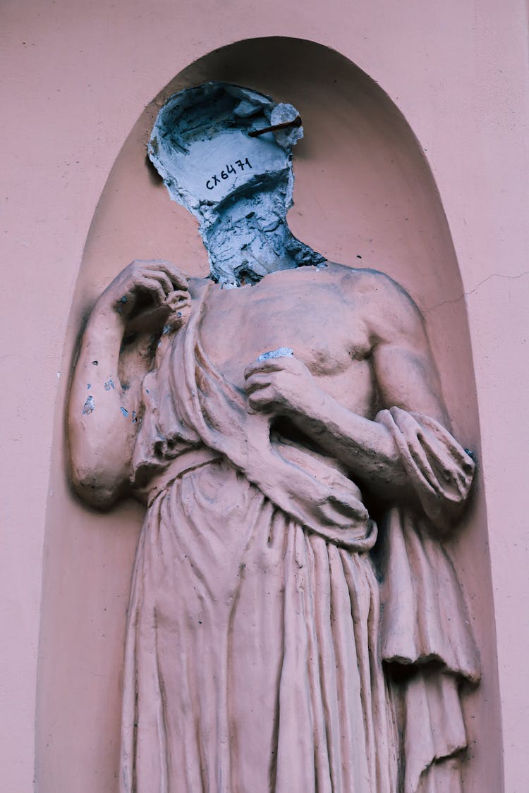 Headless Statue In Niche