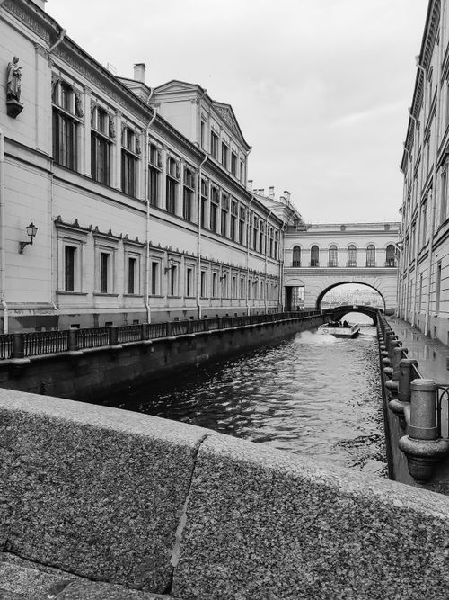 Free Black and white photo of a historic canal in Saint Petersburg with classical architecture. Stock Photo