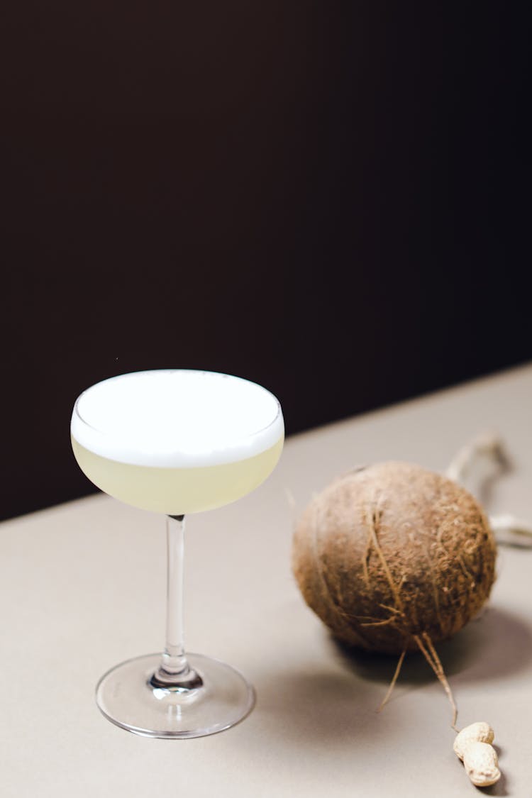 Photo Of A Cocktail Near A Coconut