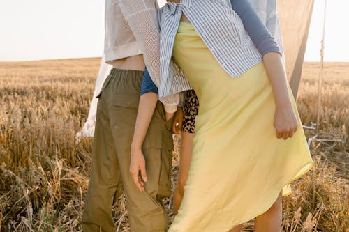 People in Casual Clothing Standing on the Farm