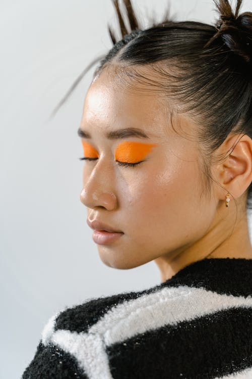 Girl with Orange Eye Makeup