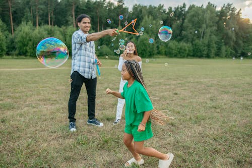 Family playing with Soap Bubbles