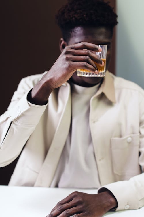 Man Holding his Drink