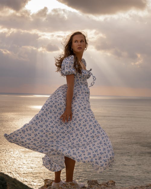 Woman in Blue and White Dress