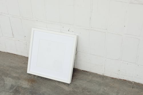 A Blank Frame on the Concrete Floor