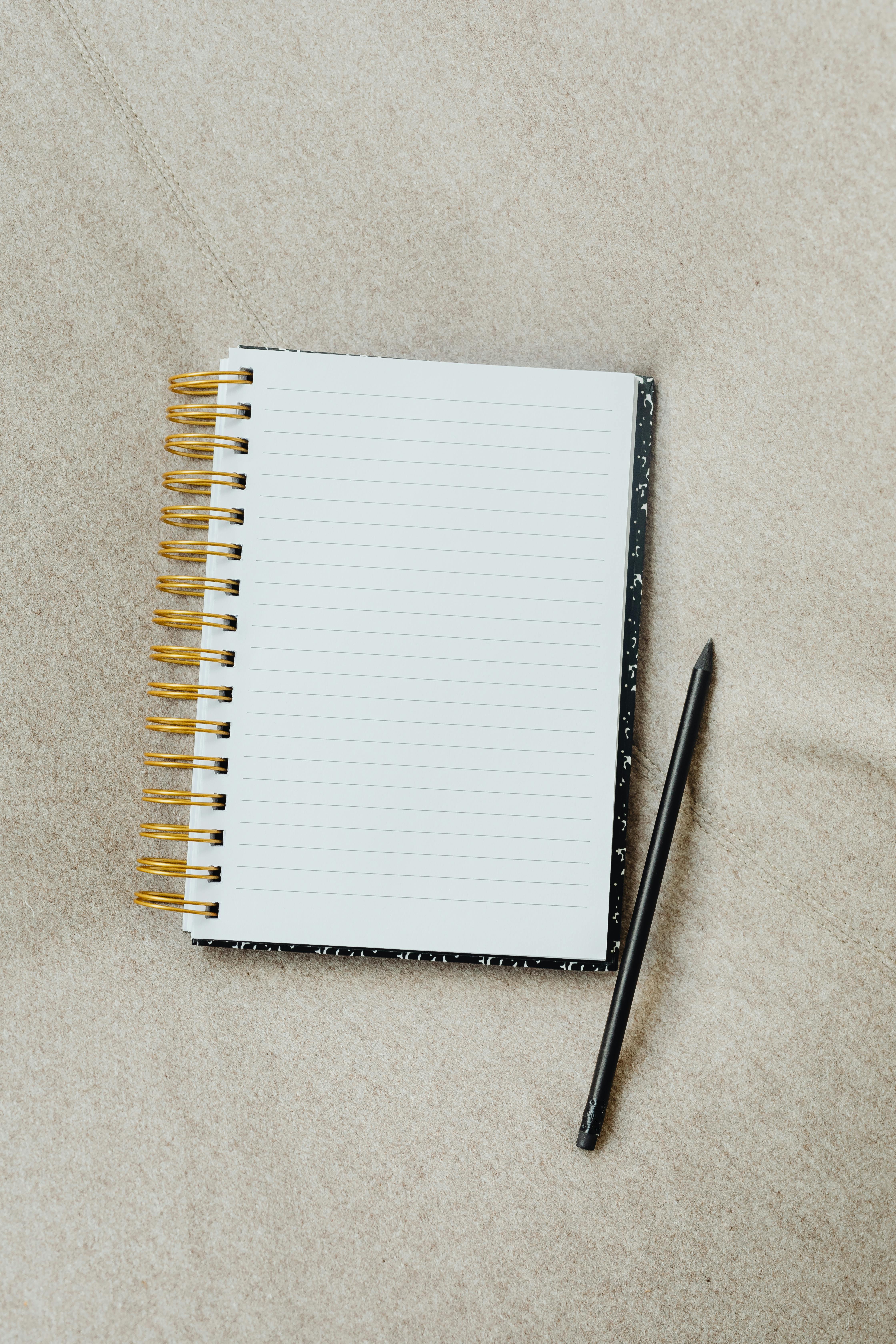 No Line Paper Note Book And Pencil Stock Photo, Picture and Royalty Free  Image. Image 65870843.
