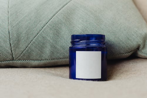 Close-Up Shot of a Blue Container