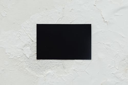 A Black Business Card on a White Background
