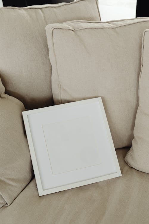 An Empty Frame on a Couch