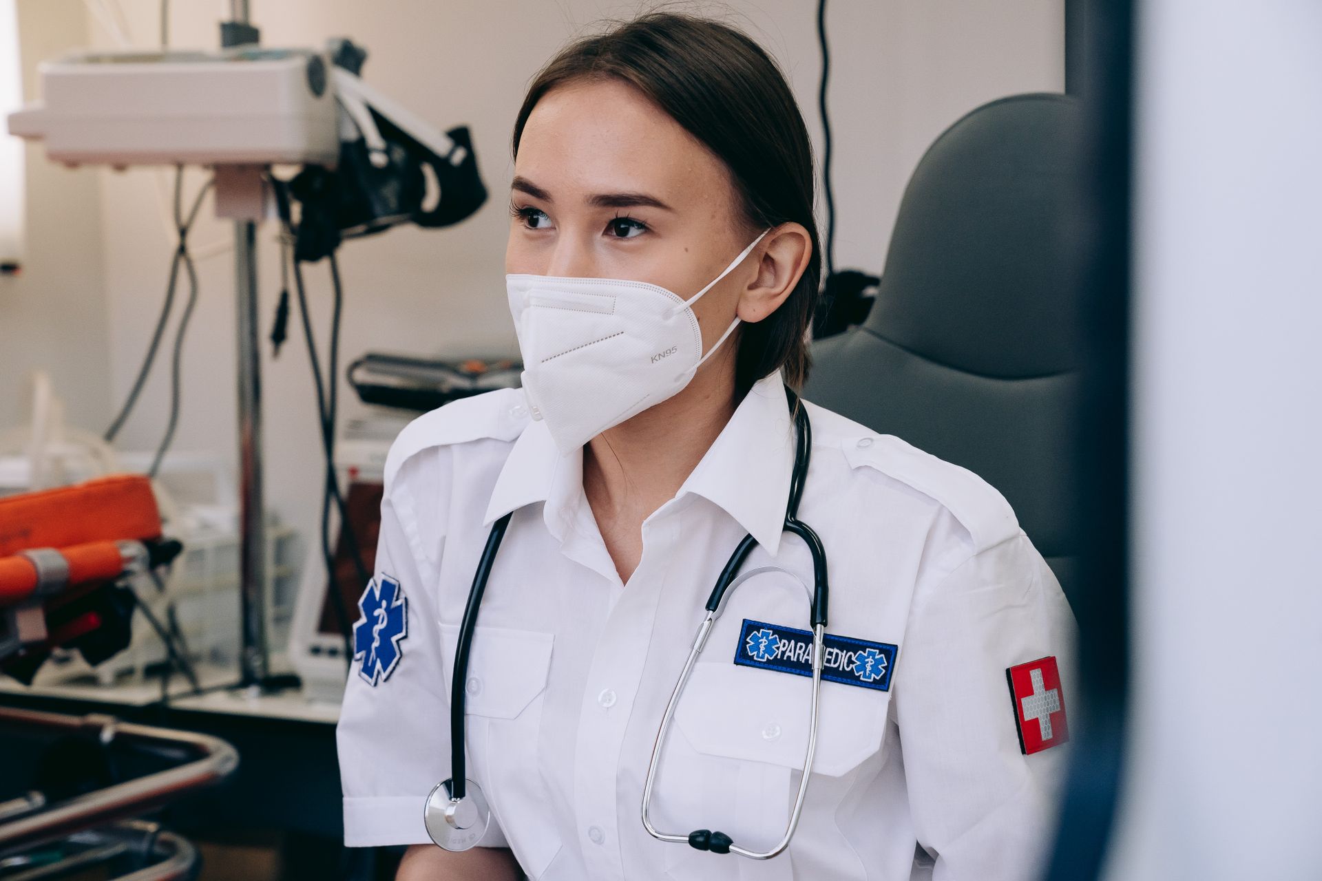 Paramedic in Ambulance Wearing Face Mask