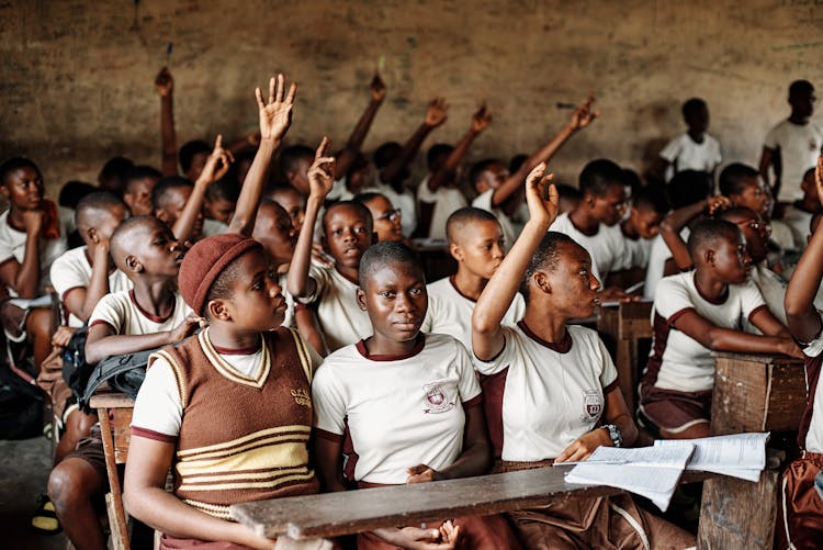 Students With Hands Raised