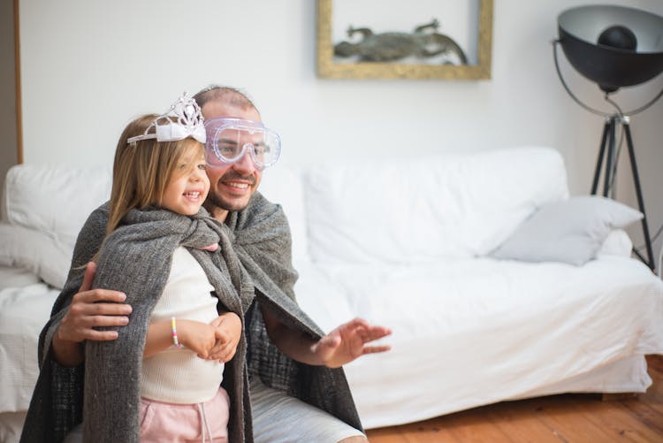 A Father Playing With Her Daughter