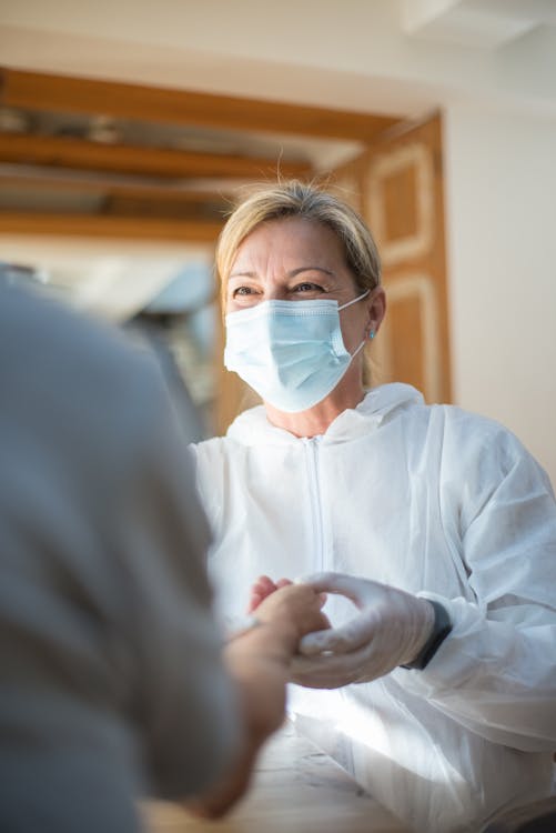 Free Woman Wearing Face Mask and Gloves Stock Photo