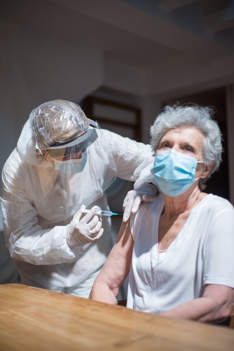 Elderly Woman Getting A Vaccine