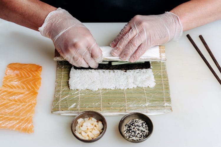 A Person Making A Sushi