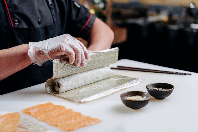 A Person Making A Sushi