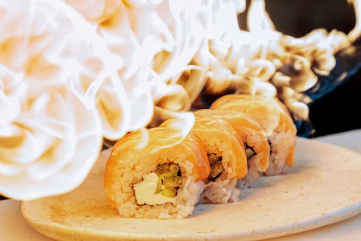 Delicious sushi roll with salmon and cucumber engulfed in flames, creating a mouthwatering display.
