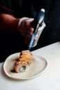 Person Torching Salmon