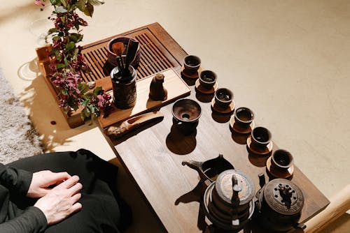 Table with Cups and Teapots