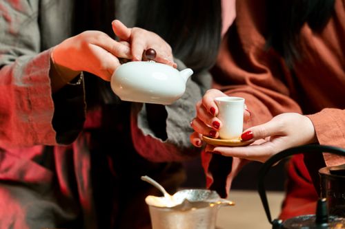Free Close-up of a traditional tea ceremony with a focus on hands and tea tools, showcasing cultural details. Stock Photo