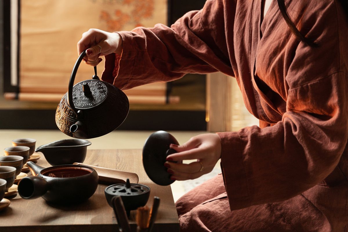 A serene traditional tea ceremony with handcrafted teaware