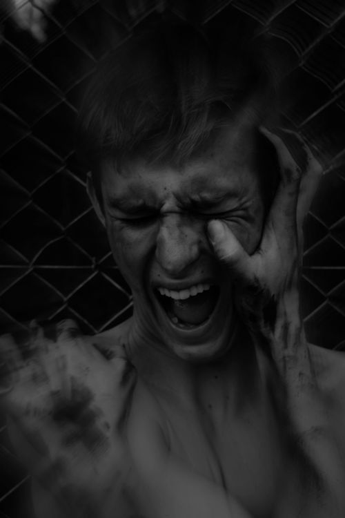 Young Man Screaming and Touching His Face with Dirty Hands · Free Stock ...