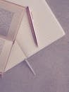 Book and Pen on Notebook