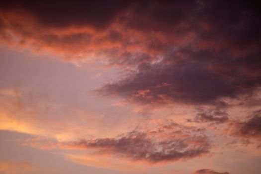 Vibrant sunset sky with dramatic purple and orange cloud formations., free online jigsaw puzzle on JigsawPuzzlesFreeOnline.org