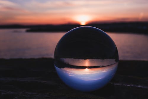 Close-Up Photography of Crystal Ball During Dawn