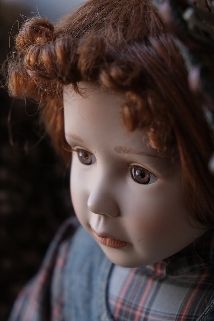 Close-up Of A Vintage Porcelain Doll Face 