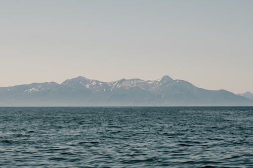 Бесплатное стоковое фото с вода, гора, закат