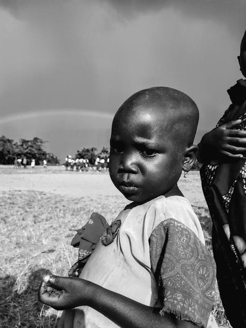 Grayscale Photo of a Child