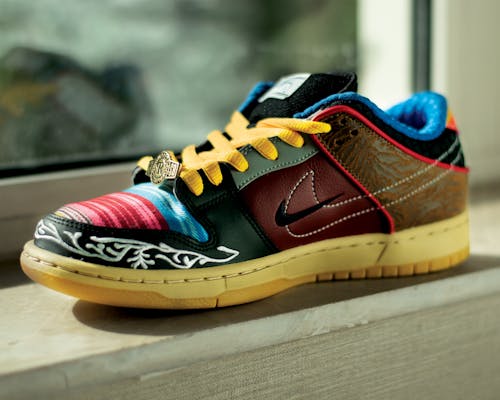 Close Up Photo of A Nike Leather Shoe In Colorful Design