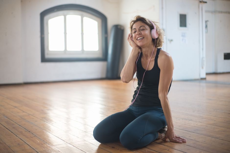 woman listening music clearly happy
