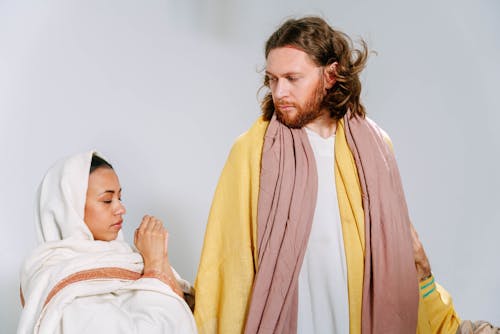 Man and Woman Wearing Scarves