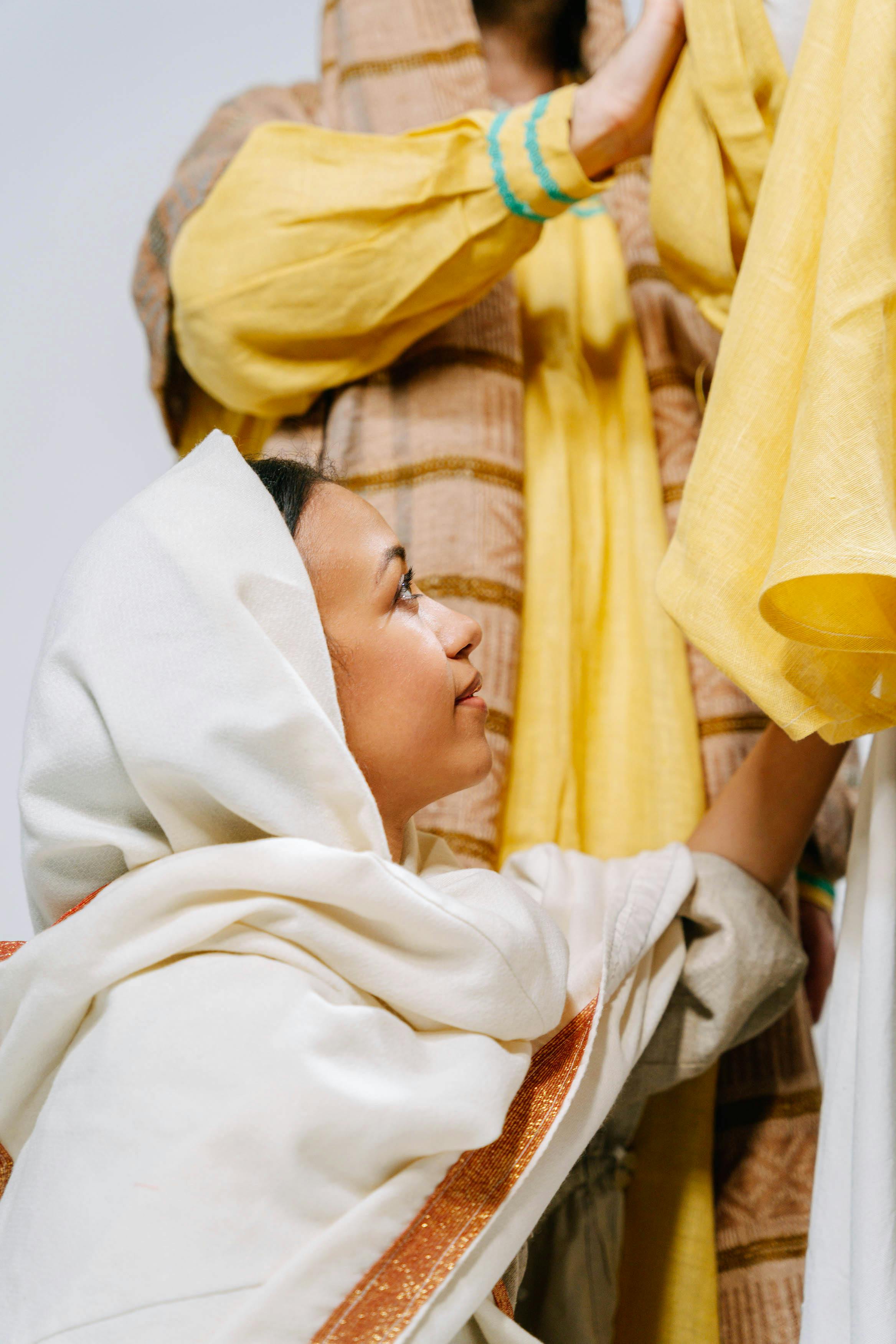 woman in white veil representing virgin mary