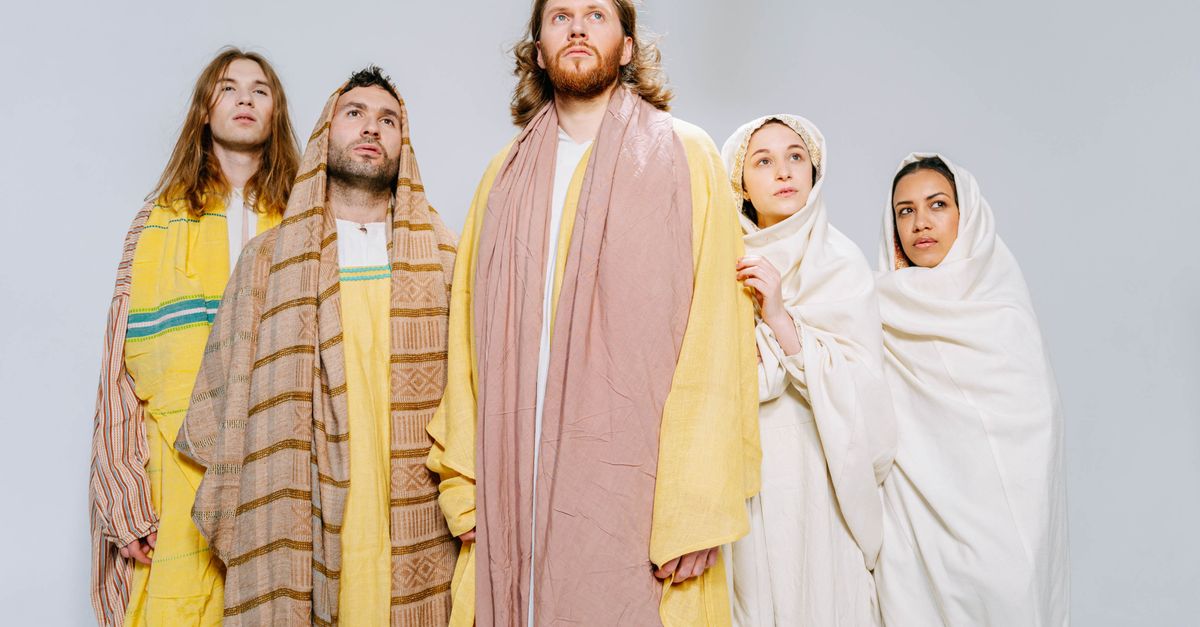 Someone Wearing Robe People Wearing Yellow and White Robes · Free Stock Photo