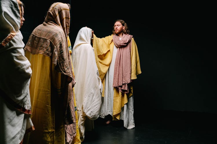 Man Representing Jesus Giving Blessing To People