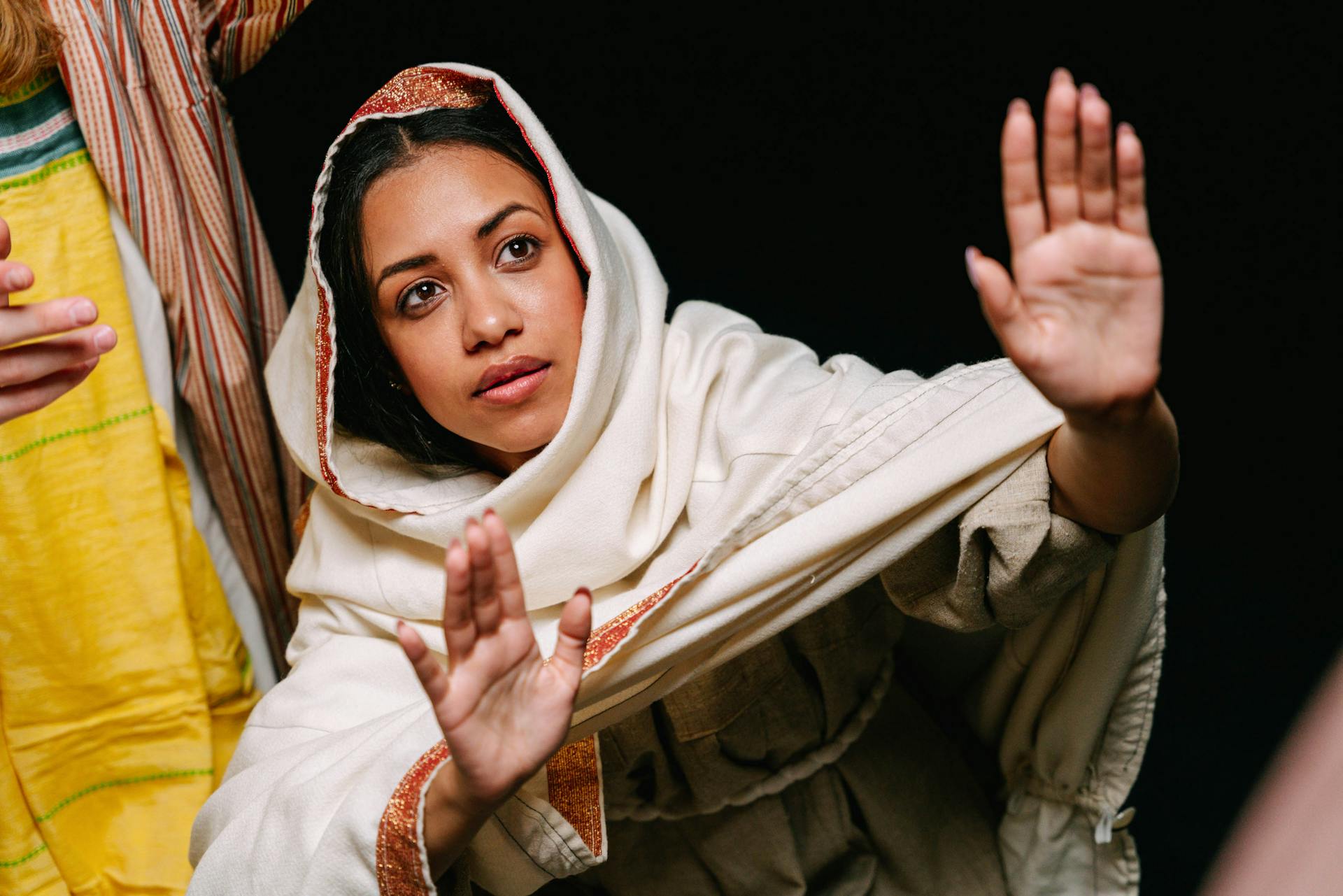 Woman in White Veil Representing Virgin Mary