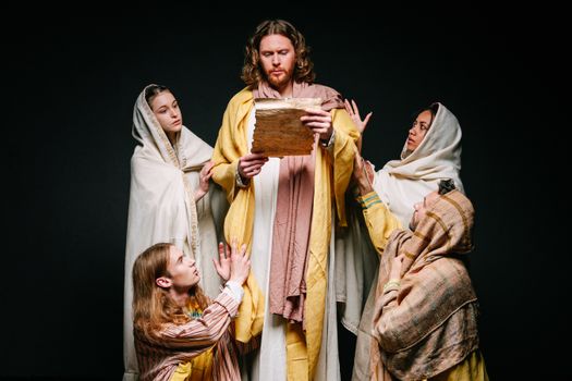 Men and Women in Jesus Christ and Apostles Costumes