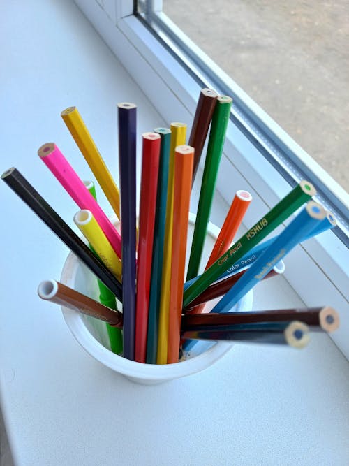 Free stock photo of coloured pencils, crayons, disposable cups